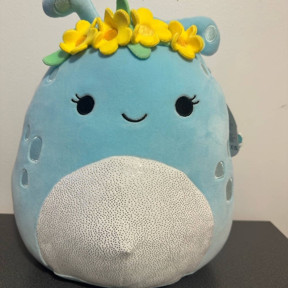 Blue Plush Toy with Yellow Flower Crown